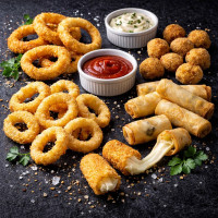 Замороженные закуски для фритюра: луковые и кальмаровые кольца